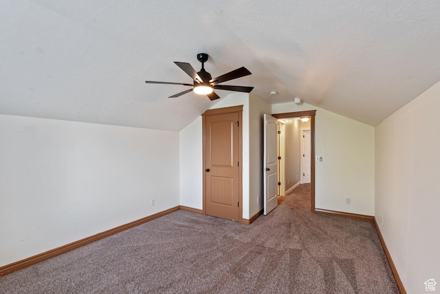 2167 W 2200 S, Syracuse, UT 84075 - additional living space with carpet flooring, vaulted ceiling, a ceiling fan, and baseboards