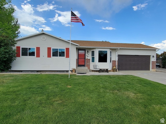 264 W 550 N, Santaquin, UT 84655 - ranch-style house with a garage, concrete driveway, a front yard, entry steps, and brick siding