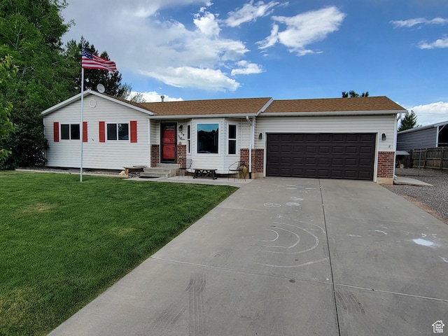 264 W 550 N, Santaquin, UT 84655 - ranch-style home featuring driveway, an attached garage, a front yard, and brick siding
