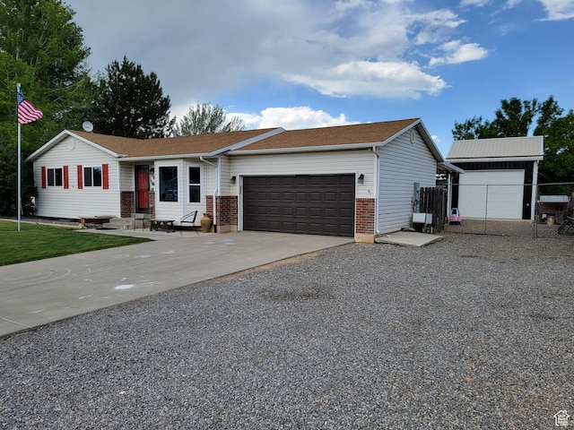 264 W 550 N, Santaquin, UT 84655 - ranch-style house featuring a garage, concrete driveway, and brick siding