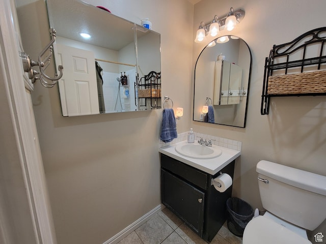 264 W 550 N, Santaquin, UT 84655 - full bathroom with vanity, toilet, tile patterned flooring, a shower, and baseboards