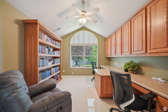 2082 W Jordan Villa Dr, West Jordan, UT 84088 - office with built in desk, vaulted ceiling, ceiling fan, light colored carpet, and baseboards