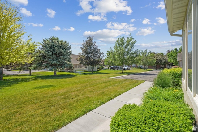 2082 W Jordan Villa Dr, West Jordan, UT 84088 - surrounding community featuring a yard