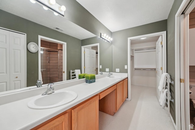 2082 W Jordan Villa Dr, West Jordan, UT 84088 - full bath featuring a closet, double vanity, a shower, and baseboards