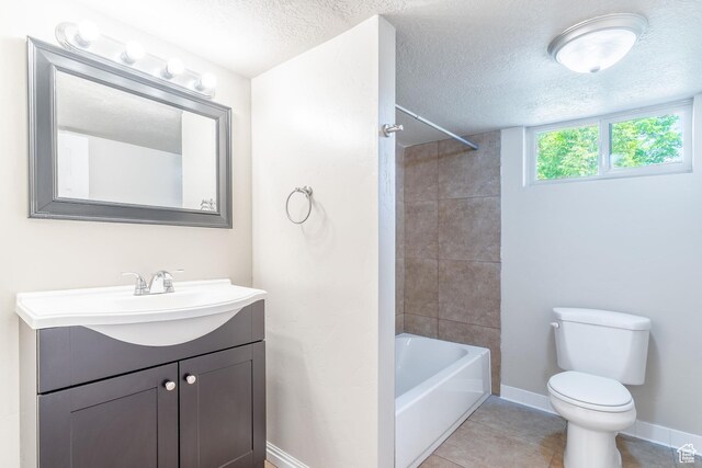 289 E 4800 S, Murray, UT 84107 - full bath with toilet, a textured ceiling, vanity, bathtub / shower combination, and tile patterned flooring
