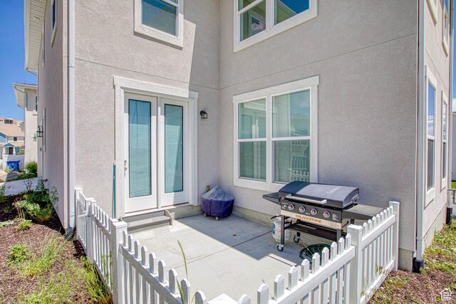 7776 S Iron Core Ln, West Jordan, UT 84081 - fenced backyard featuring a patio