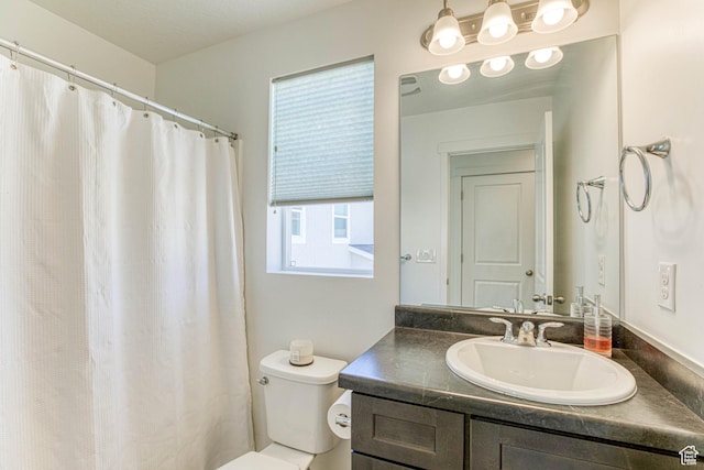 7776 S Iron Core Ln, West Jordan, UT 84081 - full bathroom featuring vanity, toilet, and curtained shower