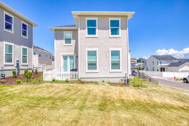 7776 S Iron Core Ln, West Jordan, UT 84081 - back of house with a residential view and stucco siding