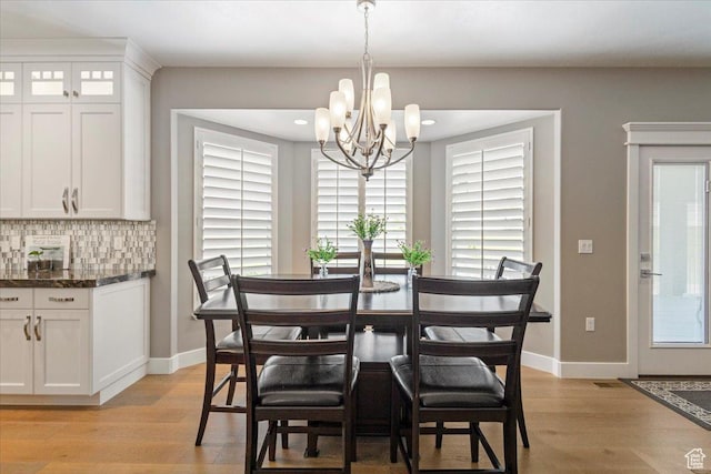 8176 S Chilwell Cv W, West Jordan, UT 84081 - dining room featuring a chandelier, light wood-style flooring, baseboards, and recessed lighting
