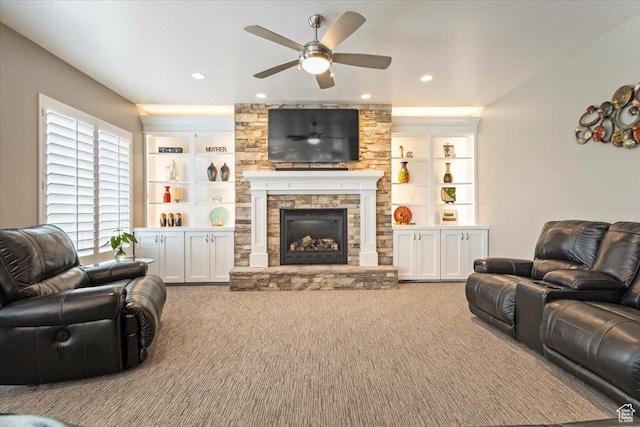8176 S Chilwell Cv W, West Jordan, UT 84081 - carpeted living room with ceiling fan, a fireplace, recessed lighting, and built in features