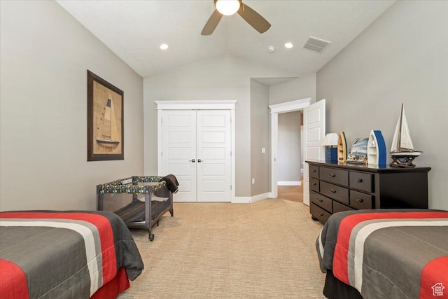 8176 S Chilwell Cv W, West Jordan, UT 84081 - bedroom with light carpet, lofted ceiling, a ceiling fan, a closet, and baseboards