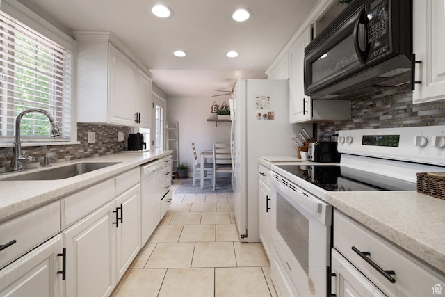 392 N 600 E, Roosevelt, UT 84066 - kitchen with white appliances, a sink, recessed lighting, white cabinetry, and backsplash