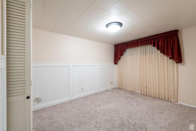 3695 S 2140 E, Salt Lake City, UT 84109 - spare room featuring carpet flooring and wainscoting