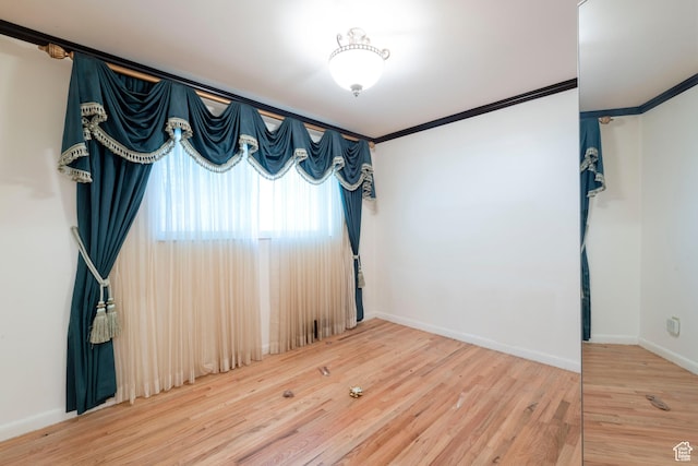 3695 S 2140 E, Salt Lake City, UT 84109 - unfurnished room featuring wood finished floors, crown molding, and baseboards