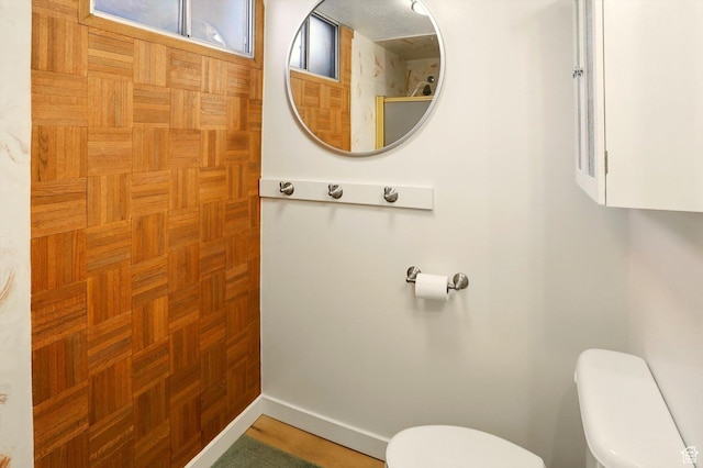 1130 W 1200 N, Provo, UT 84604 - bathroom featuring toilet, baseboards, and a shower