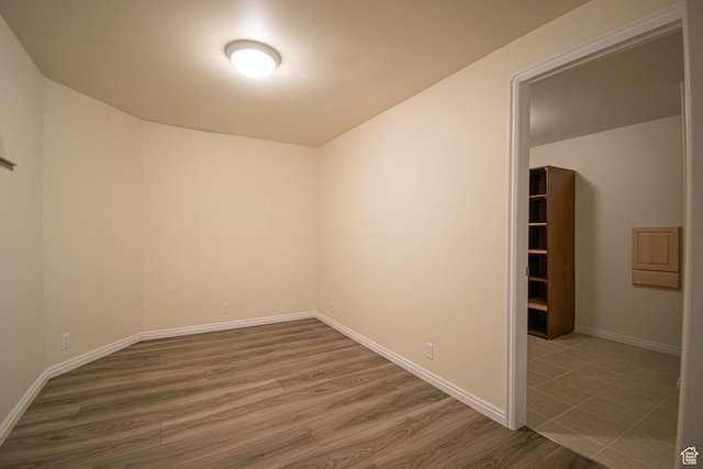 584 S Oak Ln, Tooele, UT 84074 - unfurnished room featuring wood finished floors and baseboards