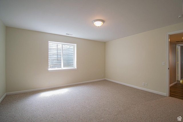 584 S Oak Ln, Tooele, UT 84074 - spare room featuring carpet floors and baseboards