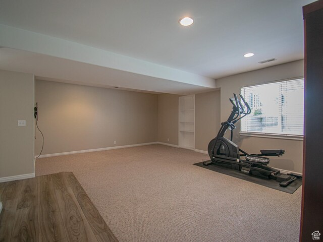 584 S Oak Ln, Tooele, UT 84074 - exercise room featuring recessed lighting, baseboards, carpet flooring, and built in shelves