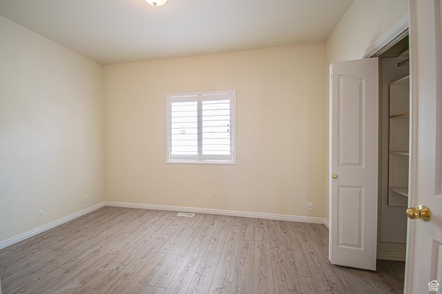 584 S Oak Ln, Tooele, UT 84074 - spare room featuring wood finished floors and baseboards