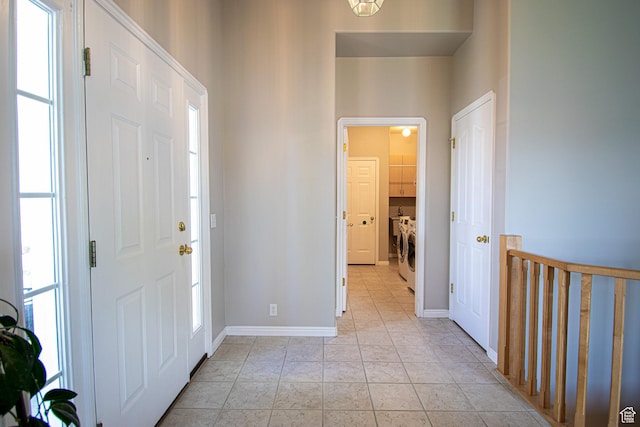 584 S Oak Ln, Tooele, UT 84074 - entrance foyer featuring independent washer and dryer and baseboards