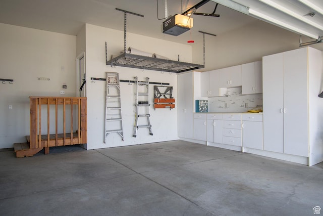 584 S Oak Ln, Tooele, UT 84074 - garage featuring a garage door opener