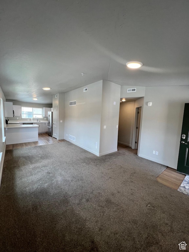 1140 W 950 N Unit C401, Orem, UT 84057 - unfurnished living room with carpet flooring and baseboards