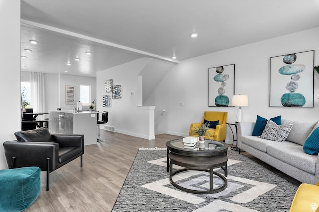 1897 E Thunder Ln Unit 498, Eagle Mountain, UT 84005 - living area with light wood finished floors, recessed lighting, and baseboards