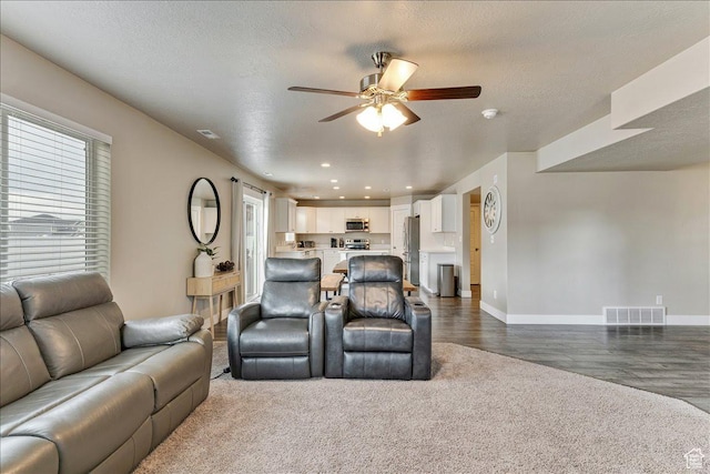 399 N 1325 W, Springville, UT 84663 - living area with ceiling fan, baseboards, dark wood finished floors, recessed lighting, and a textured ceiling