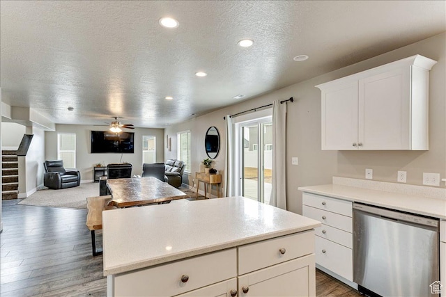 399 N 1325 W, Springville, UT 84663 - kitchen with dishwasher, a textured ceiling, a kitchen island, plenty of natural light, and light wood finished floors