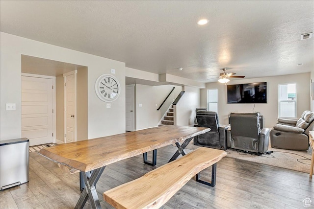 399 N 1325 W, Springville, UT 84663 - dining area with stairs, light wood-type flooring, ceiling fan, and a textured ceiling