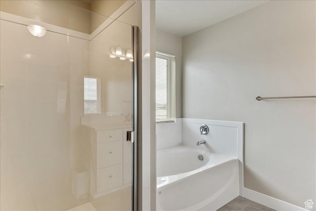 399 N 1325 W, Springville, UT 84663 - bathroom with a garden tub, a shower stall, baseboards, and tile patterned floors