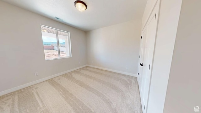 1151 S 4475 W, Cedar City, UT 84720 - spare room featuring light carpet and baseboards