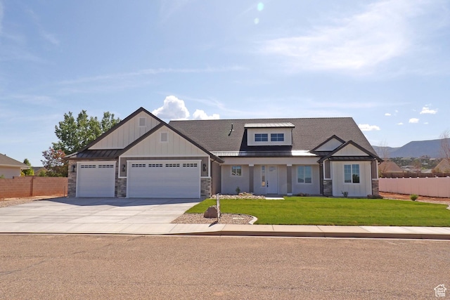 1151 S 4475 W, Cedar City, UT 84720 - craftsman-style home featuring an attached garage, stone siding, board and batten siding, driveway, and roof with shingles