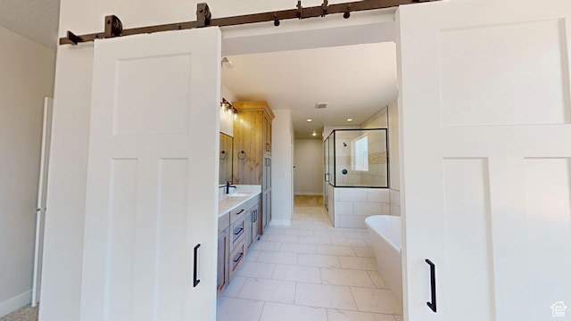 1151 S 4475 W, Cedar City, UT 84720 - full bathroom featuring a shower stall, a soaking tub, double vanity, marble look tiles, and baseboards