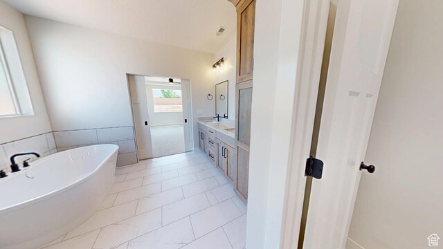 1151 S 4475 W, Cedar City, UT 84720 - bathroom featuring a soaking tub and double vanity