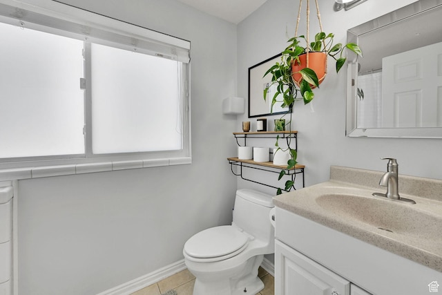 3926 W 5100 S, Roy, UT 84067 - full bath featuring vanity, toilet, baseboards, tile patterned floors, and washer / clothes dryer