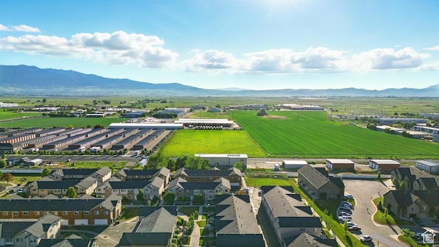 1587 N 565 W Unit 101, Logan, UT 84341 - aerial perspective of suburban area with a mountainous background