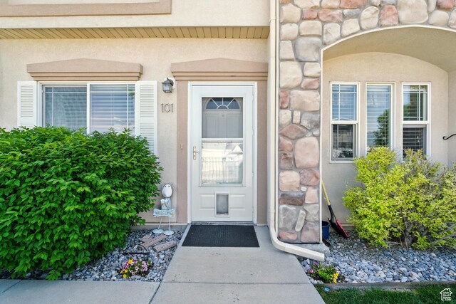 1587 N 565 W Unit 101, Logan, UT 84341 - entrance to property featuring stone siding and stucco siding