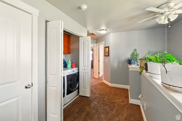 1587 N 565 W Unit 101, Logan, UT 84341 - laundry room with separate washer and dryer, dark colored carpet, baseboards, a ceiling fan, and a textured ceiling