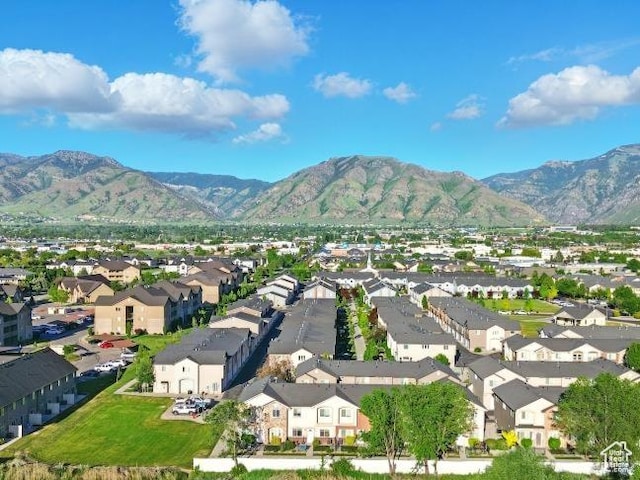 1587 N 565 W Unit 101, Logan, UT 84341 - aerial perspective of suburban area with a mountainous background