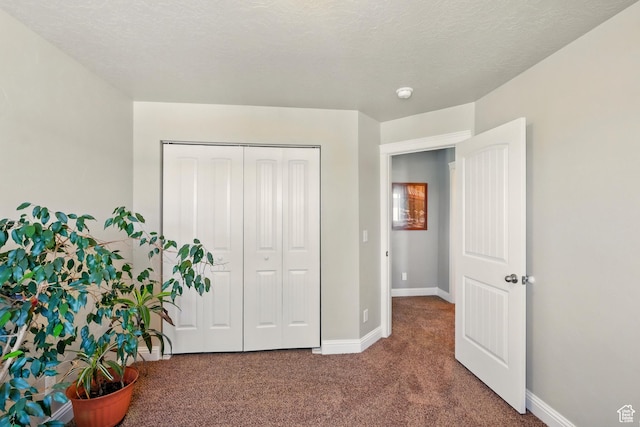 1587 N 565 W Unit 101, Logan, UT 84341 - bedroom with carpet floors, baseboards, and a closet