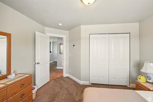 1587 N 565 W Unit 101, Logan, UT 84341 - bedroom with carpet, baseboards, and a closet