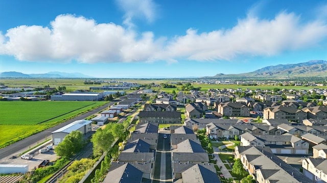 1587 N 565 W Unit 101, Logan, UT 84341 - aerial perspective of suburban area with a mountain backdrop