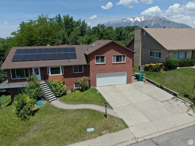 314 W 1700 S, Orem, UT 84058 - single story home with roof mounted solar panels, a front lawn, a garage, and driveway