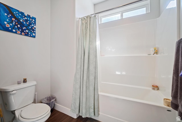 1809 W Terra Vista Ln Unit H202, Saratoga Springs, UT 84045 - bathroom with wood finished floors, toilet, shower / tub combo with curtain, and baseboards