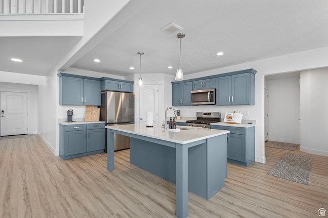 6636 W Ipswitch Way S, Herriman, UT 84096 - kitchen with appliances with stainless steel finishes, a sink, baseboards, light countertops, and recessed lighting