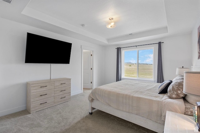 6636 W Ipswitch Way S, Herriman, UT 84096 - bedroom featuring a raised ceiling, light carpet, and baseboards