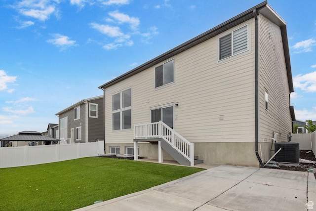 6636 W Ipswitch Way S, Herriman, UT 84096 - back of house with central AC and a patio area