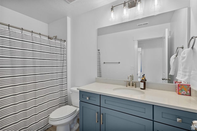 6636 W Ipswitch Way S, Herriman, UT 84096 - bathroom featuring vanity, toilet, and a shower with curtain