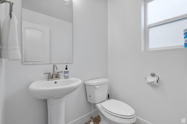 6636 W Ipswitch Way S, Herriman, UT 84096 - bathroom with baseboards, toilet, and a sink